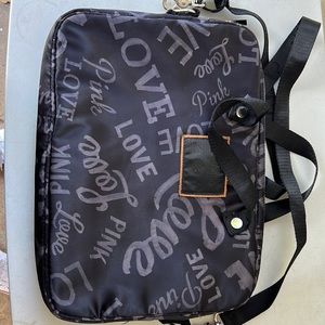 Victorias Secret PINK laptop bag with top handle and detachable strap.